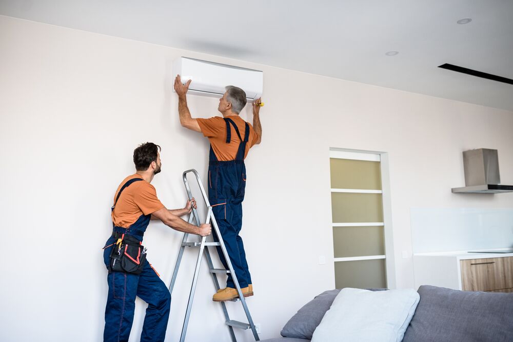 On The Double technician installing a new AC system